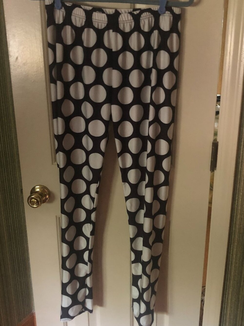 A pair of polka dot pull up leggings size  XL